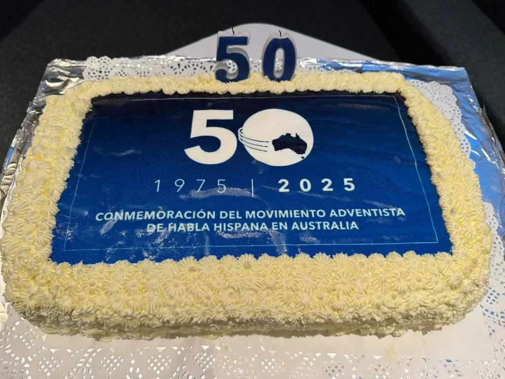 A commemorative cake of the fiftieth anniversary of the Spanish-speaking Seventh-day Adventist work in Australia. [Photo: Adventist Record]